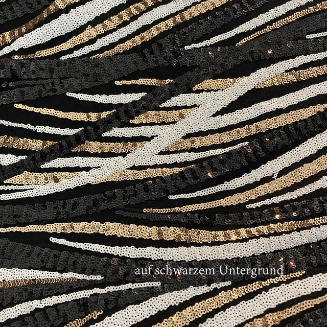 Sequins intertwined in wavy stripes black gold white on black tulle | View: Sequins intertwined in wavy stripes black gold white on black tulle